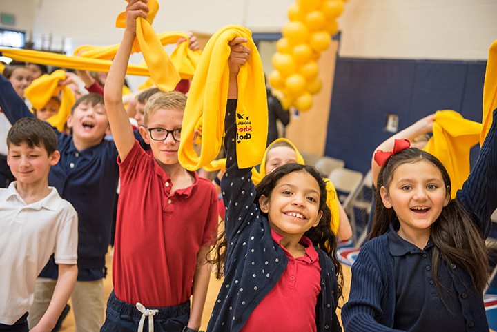 Students-Wave-Yellow-Scarves